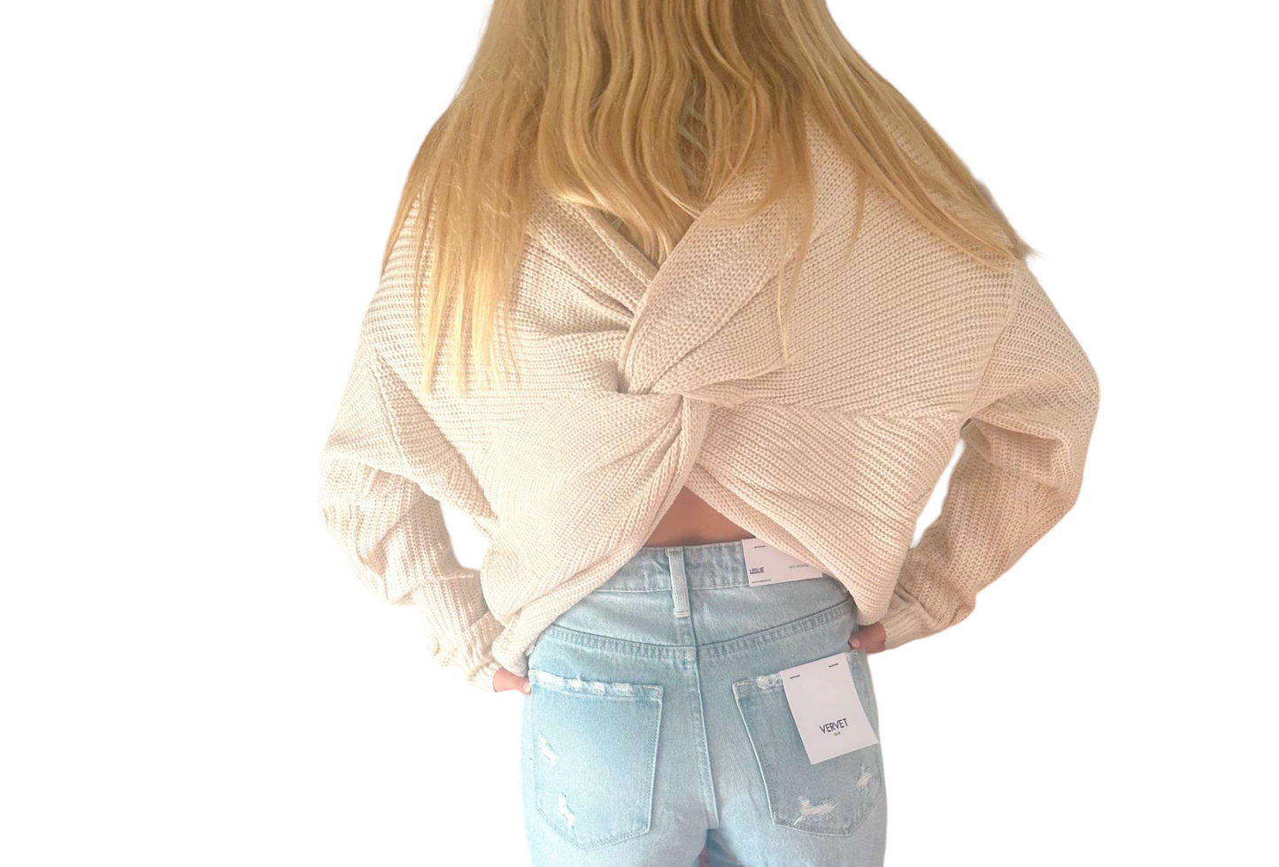 Twisted Elegance: Cream Knit Sweater